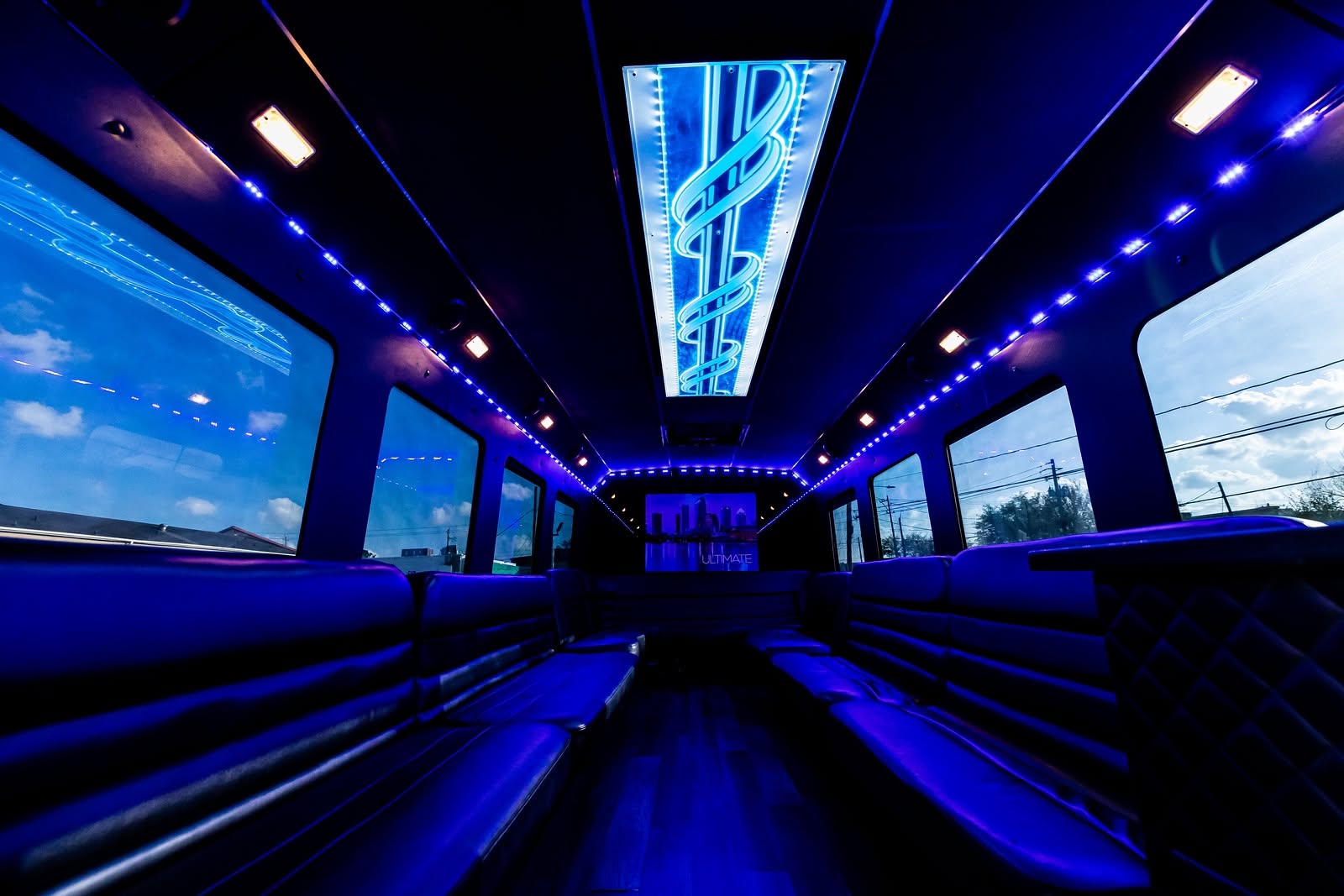 Party bus interior glowing blue